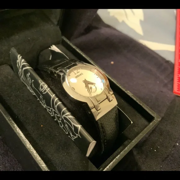 original VERSACE round silver face with black leather strap